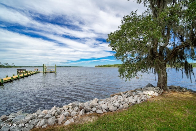 view of dock with a water view