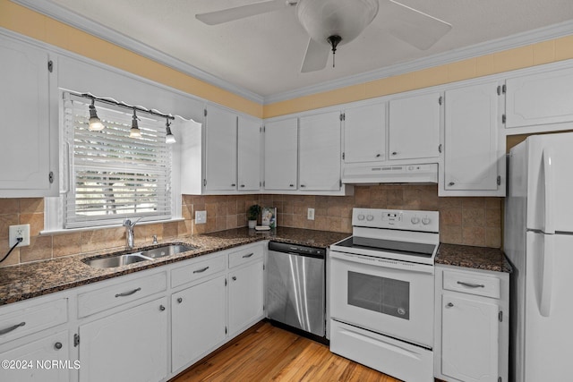 kitchen with light wood-type flooring, white appliances, crown molding, sink, and white cabinets