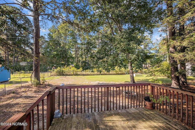 deck featuring a yard