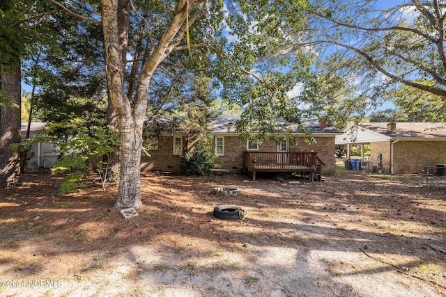 exterior space featuring a deck