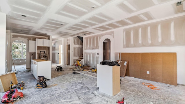 kitchen featuring white cabinets