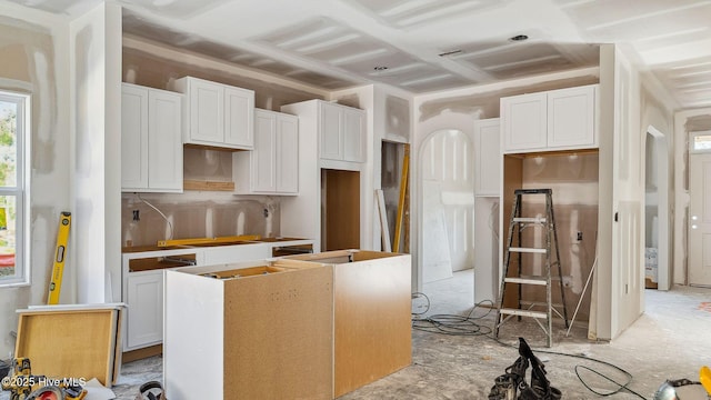 kitchen featuring white cabinets and a kitchen island