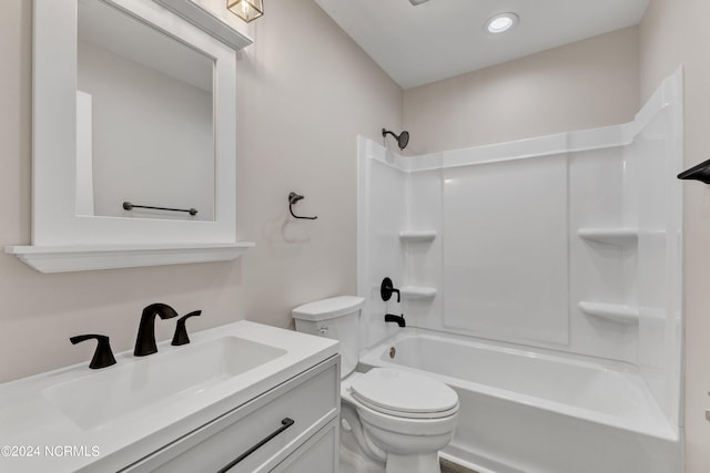 full bathroom with shower / bathing tub combination, vanity, and toilet