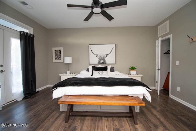 bedroom featuring ceiling fan and dark hardwood / wood-style flooring