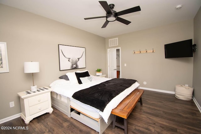 bedroom with ceiling fan, baseboards, visible vents, and dark wood finished floors