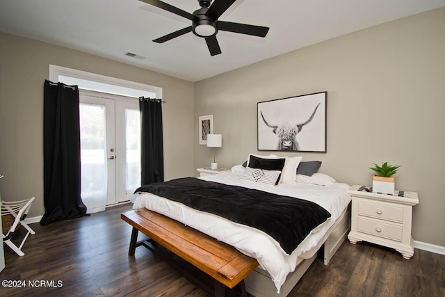 bedroom with visible vents, access to exterior, baseboards, dark wood-type flooring, and french doors