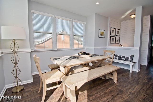 dining area with baseboards, recessed lighting, wood finished floors, and a wealth of natural light