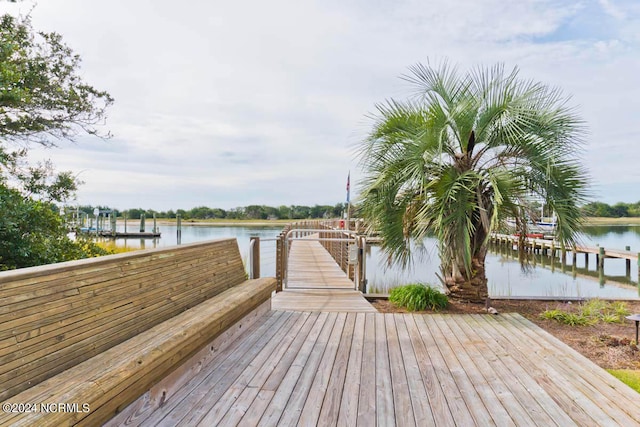 dock area featuring a water view