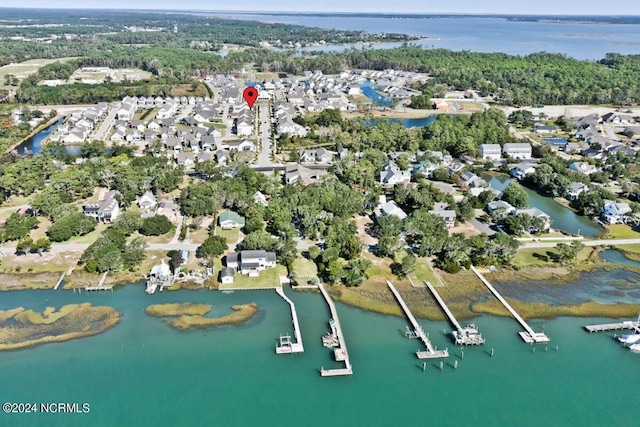 aerial view featuring a water view and a residential view