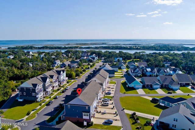 drone / aerial view with a water view