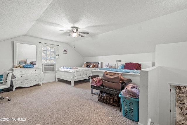 bedroom featuring a textured ceiling, carpet floors, ceiling fan, and lofted ceiling