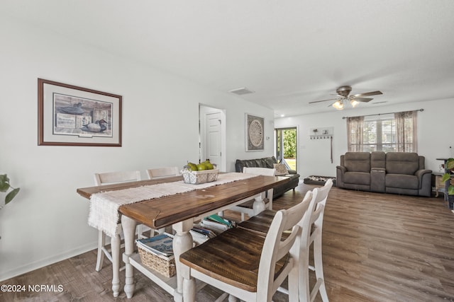 dining room with wood-type flooring and ceiling fan