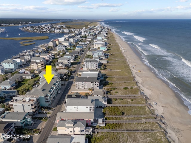 aerial view with a view of the beach and a water view