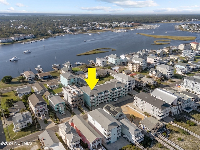 birds eye view of property featuring a water view