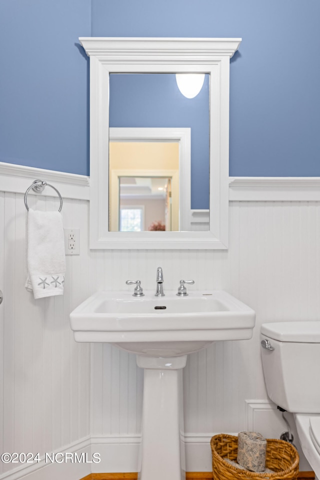 bathroom with sink and toilet