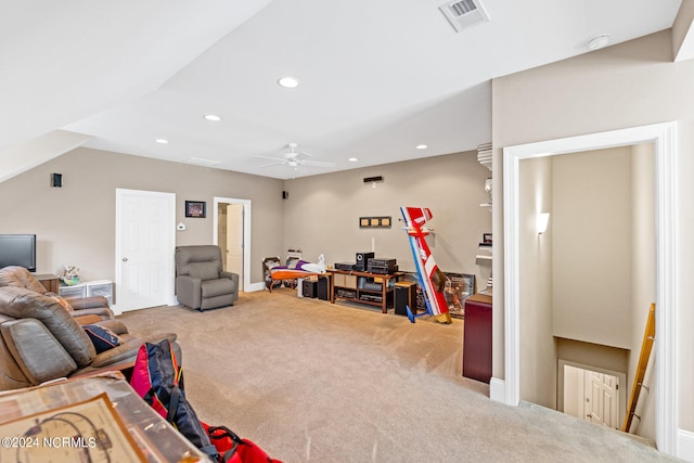 living room with ceiling fan and carpet flooring