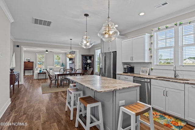 kitchen featuring sink, white cabinets, ceiling fan, and appliances with stainless steel finishes