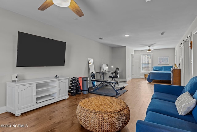 living room with light hardwood / wood-style floors