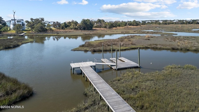 dock area featuring a water view