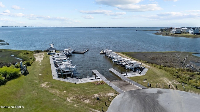 birds eye view of property featuring a water view