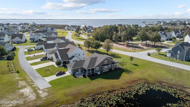 drone / aerial view featuring a water view