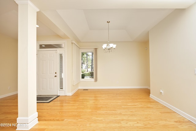 interior space featuring a notable chandelier and light hardwood / wood-style floors