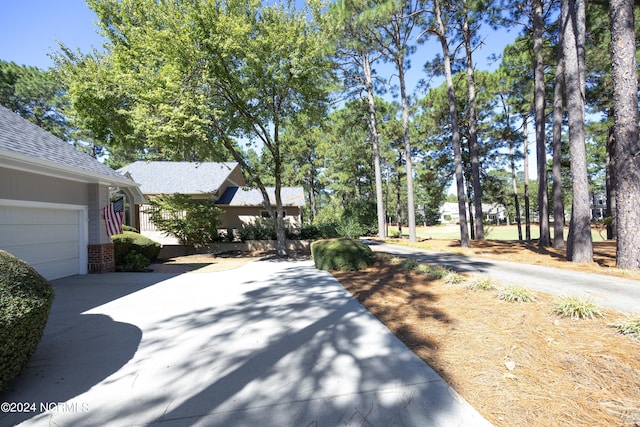 exterior space with a garage