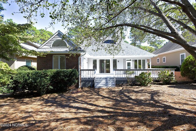 view of front facade featuring a deck