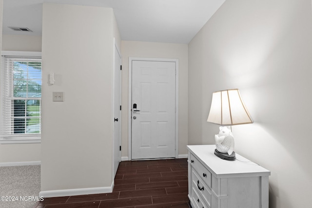 interior space with dark wood-type flooring