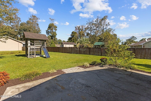 view of yard featuring a playground