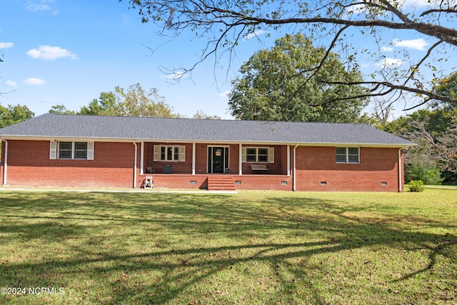 ranch-style home featuring crawl space, a porch, a front lawn, and brick siding