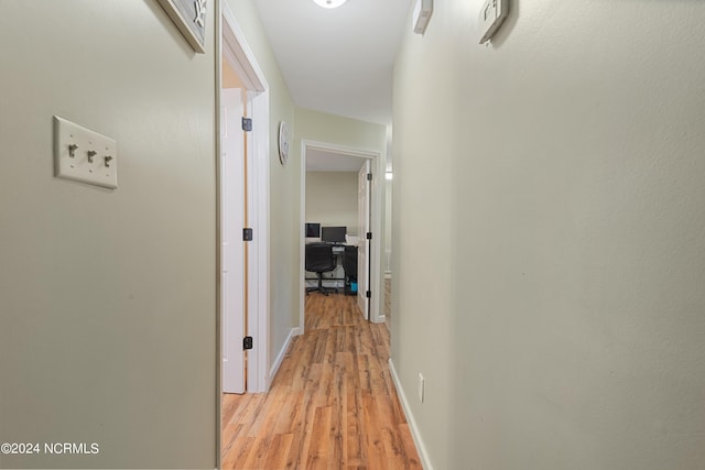 hall featuring light hardwood / wood-style flooring