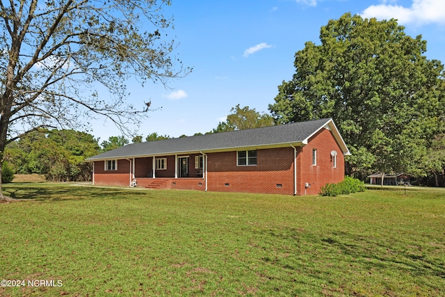 ranch-style house with crawl space, a front lawn, and brick siding