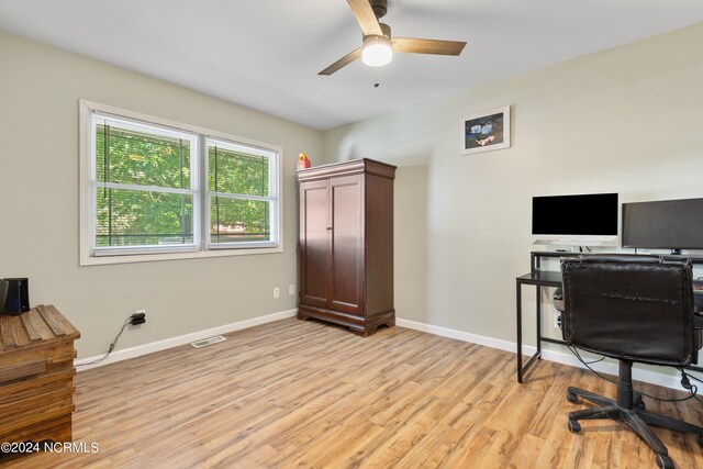 corridor featuring hardwood / wood-style floors