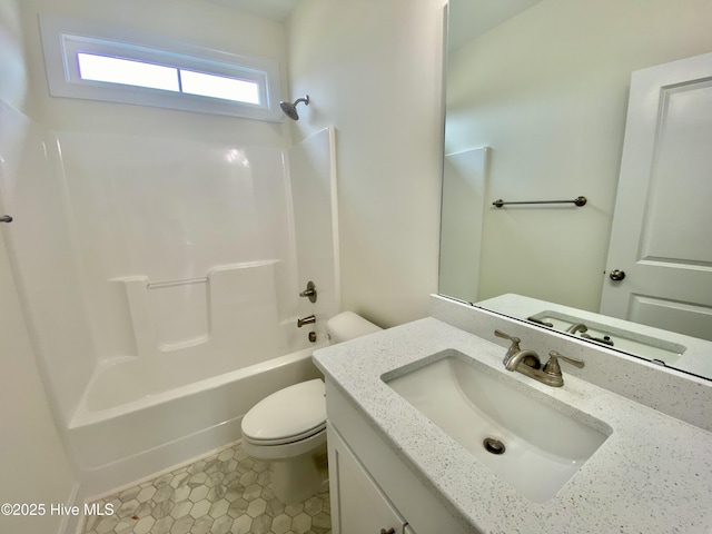 full bathroom featuring vanity, tile patterned floors, bathtub / shower combination, and toilet