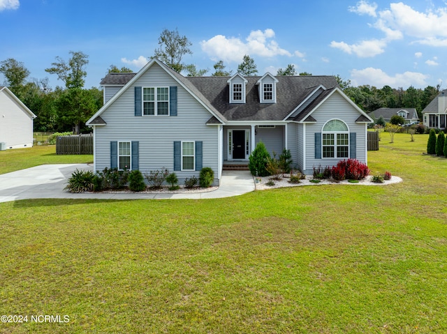 view of front of home with a front lawn