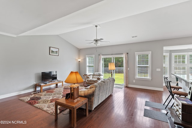 living room with ceiling fan, lofted ceiling, and dark hardwood / wood-style floors