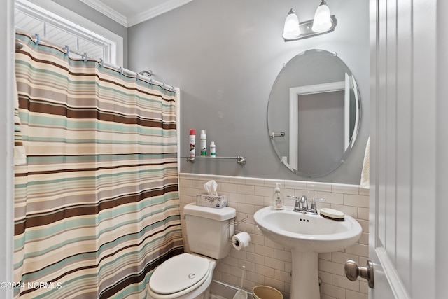 bathroom with ornamental molding, tile walls, toilet, and a shower with shower curtain