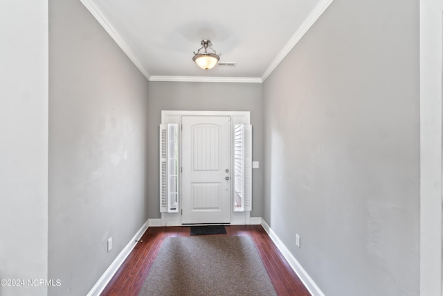 foyer with ornamental molding and dark wood-type flooring