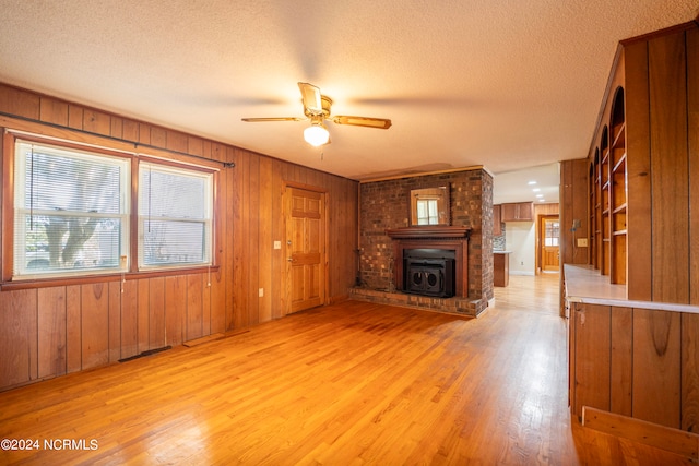 carpeted spare room featuring a textured ceiling