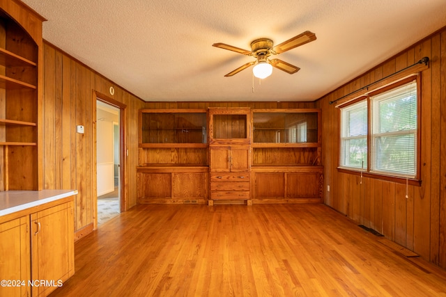 carpeted bedroom featuring a textured ceiling