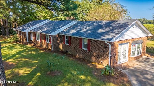 birds eye view of property with a rural view