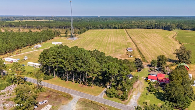 birds eye view of property with a rural view