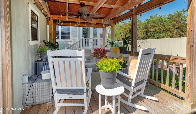 wooden deck with ceiling fan