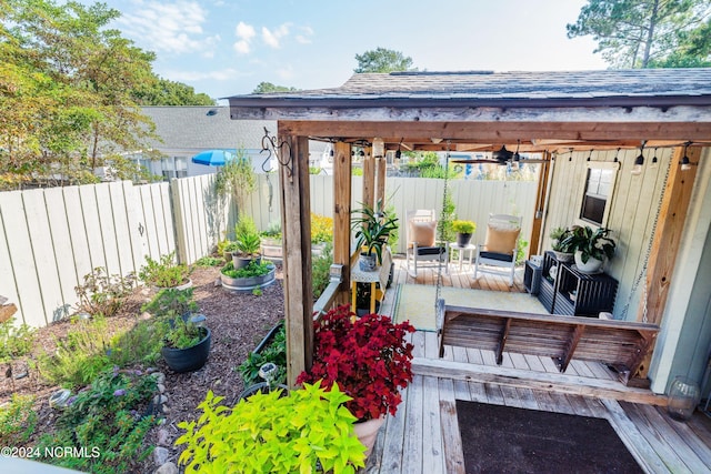 exterior space featuring a wooden deck