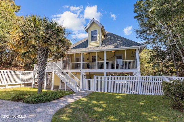 view of front of home with a front lawn and covered porch