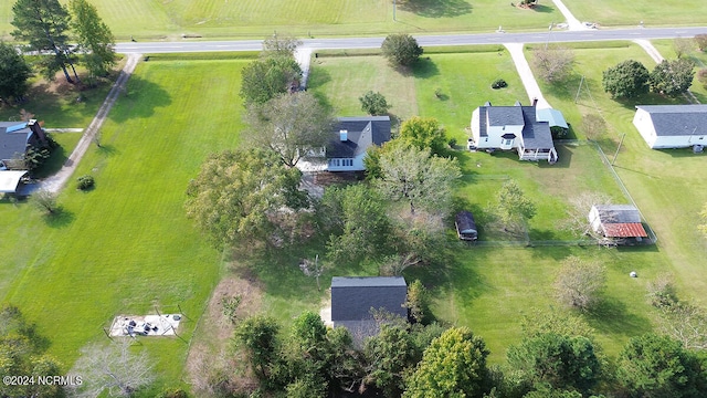 birds eye view of property with a rural view