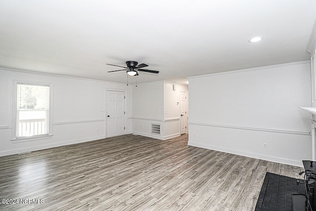 unfurnished living room with ceiling fan, light hardwood / wood-style flooring, and ornamental molding