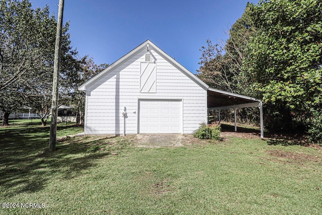 garage featuring a yard