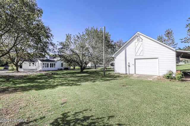 view of yard featuring a garage